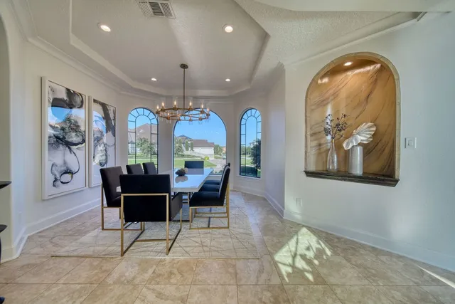 a view of a living room and balcony