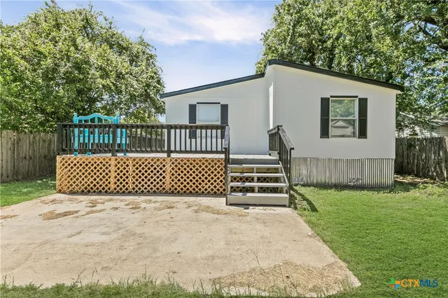 a view of a deck with a garden
