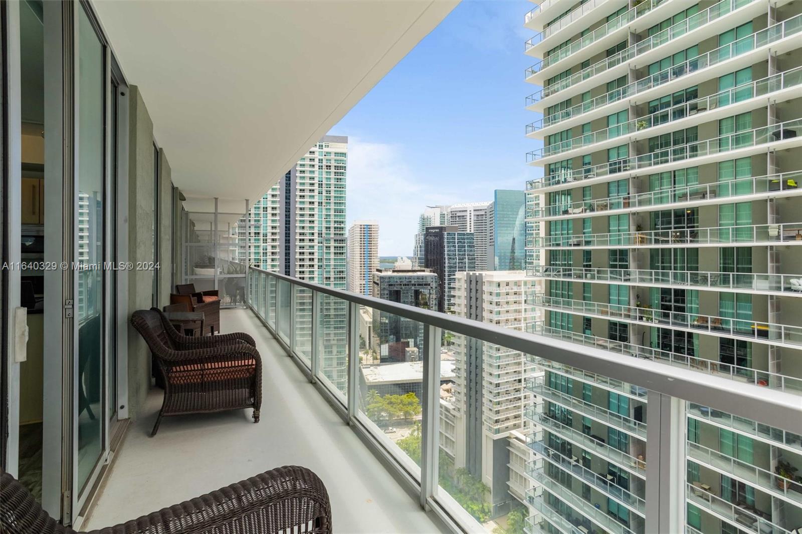 1111 Southwest 1st Avenue, Unit 3014N Miami, FL 33130 - Photo 4 of 36 a view of a balcony with couch