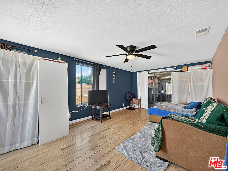 4159 Roxbury Drive Hemet, CA 92545 - Photo 11 of 28 a living room with furniture and a window