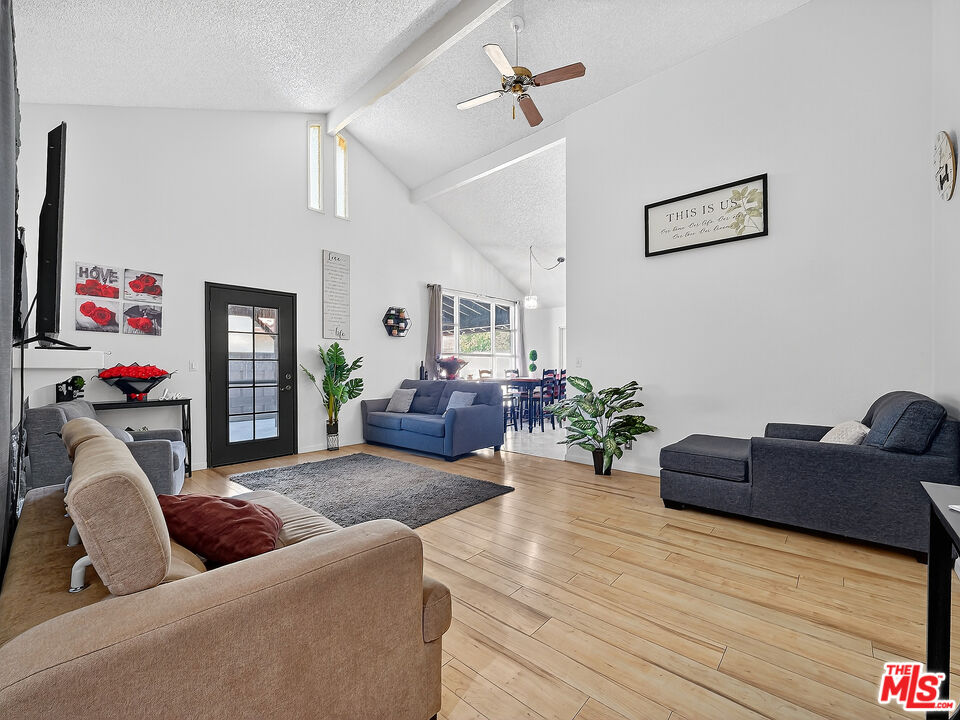 4159 Roxbury Drive Hemet, CA 92545 - Photo 18 of 28 a living room with furniture or couch and a flat screen tv