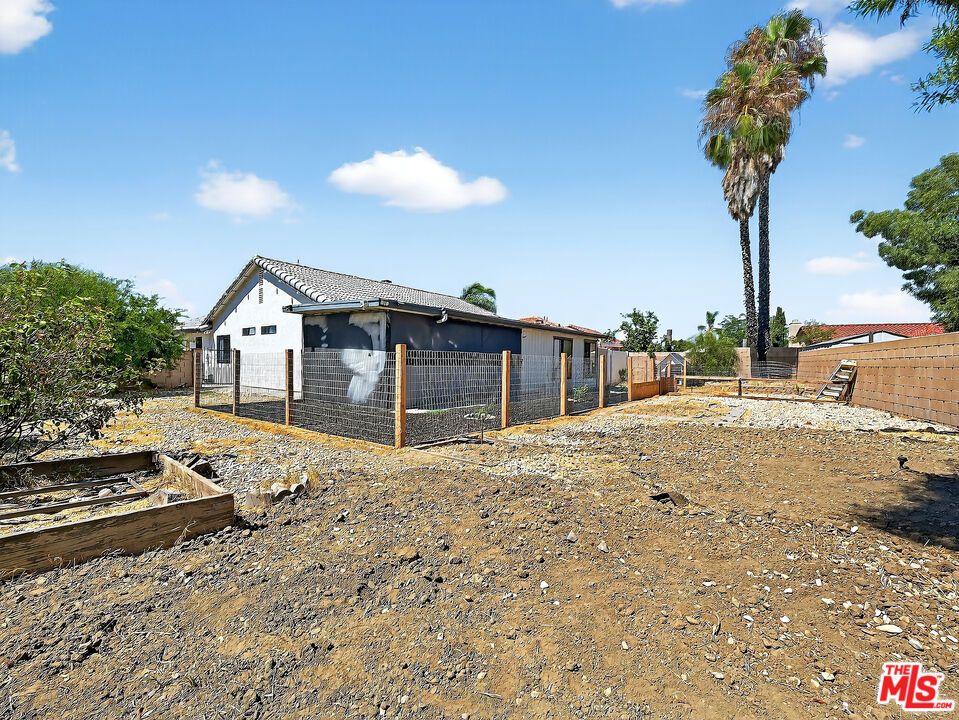 4159 Roxbury Drive Hemet, CA 92545 - Photo 10 of 28 a view of a house with a yard and garage