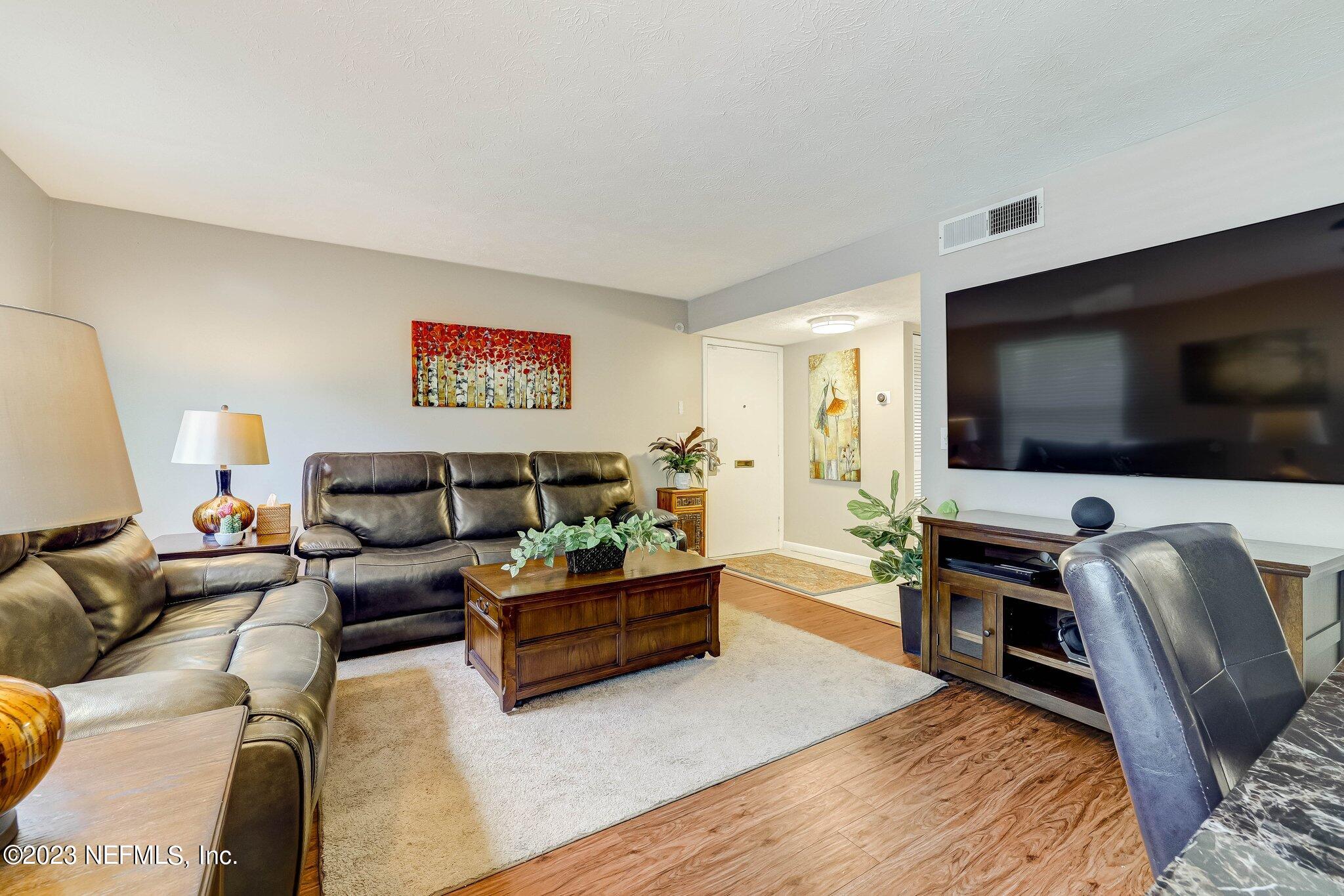 4358 Timuquana Road, Unit 102 Jacksonville, FL 32210 - Photo 8 of 42 Livingroom & wall TV