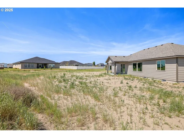 a view of a house with a lake view