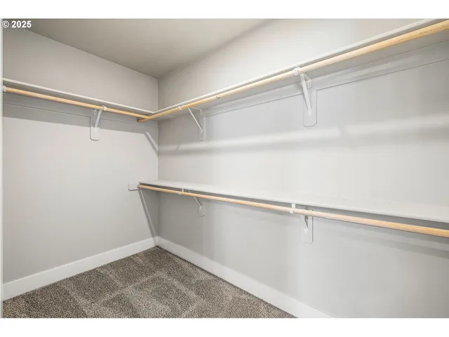 a view of an empty walk in closet