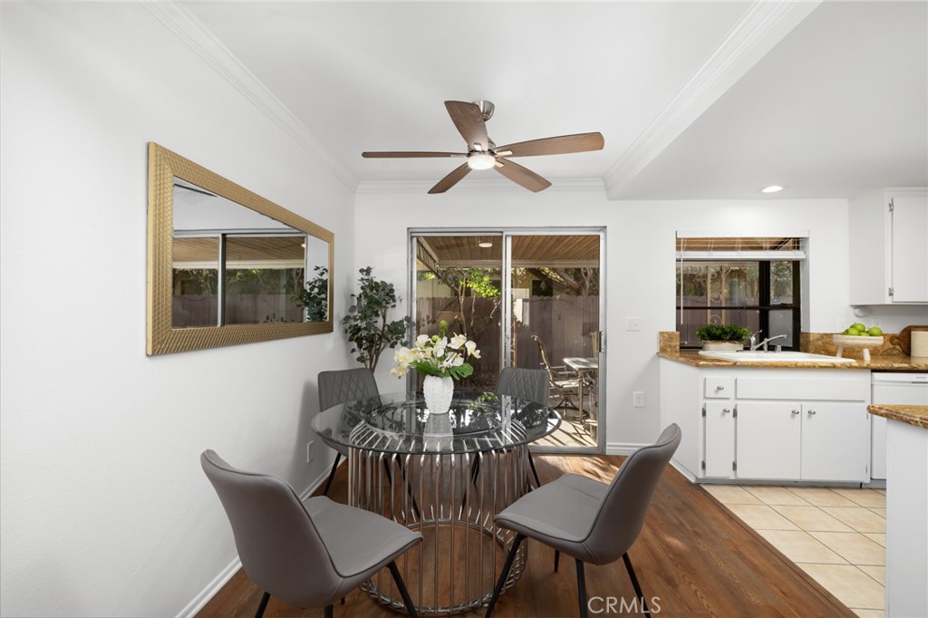 914 Fairview Avenue, Unit 13 Arcadia, CA 91007 - Photo 11 of 39 a dining room with furniture a chandelier and wooden floor