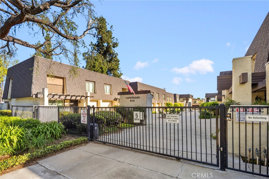 914 Fairview Avenue, Unit 13 Arcadia, CA 91007 - Photo 2 of 39 a view of a house with a small yard and wooden fence