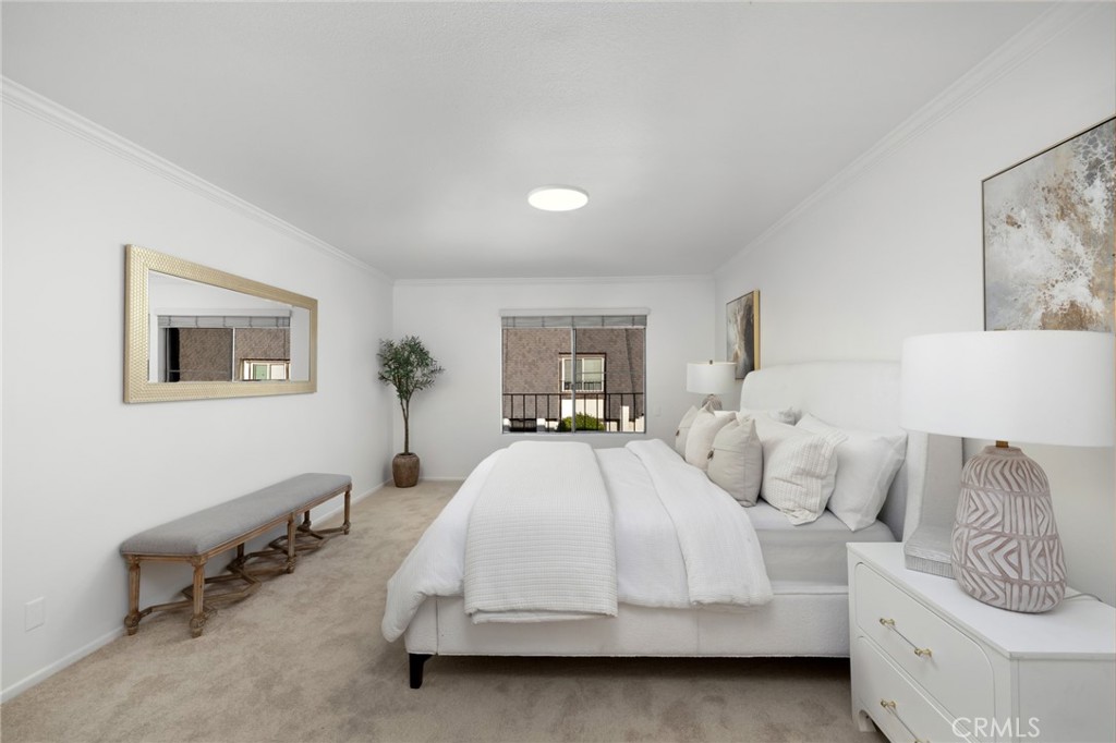 914 Fairview Avenue, Unit 13 Arcadia, CA 91007 - Photo 21 of 39 a spacious bedroom with two beds and painting on the wall