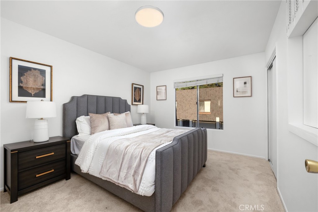 914 Fairview Avenue, Unit 13 Arcadia, CA 91007 - Photo 26 of 39 a bedroom with a bed and window