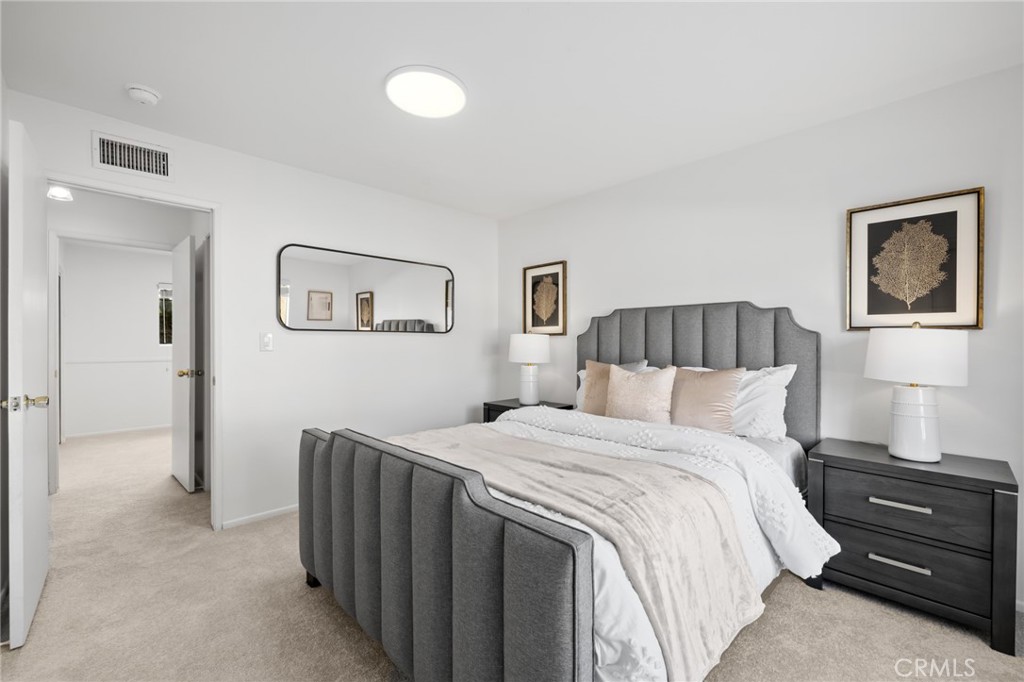 914 Fairview Avenue, Unit 13 Arcadia, CA 91007 - Photo 27 of 39 a bedroom with a bed and a painting on the wall