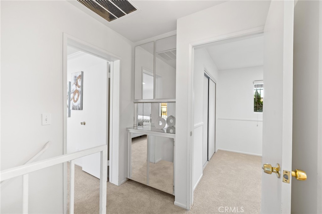 914 Fairview Avenue, Unit 13 Arcadia, CA 91007 - Photo 29 of 39 a view of a hallway with closet and a living room