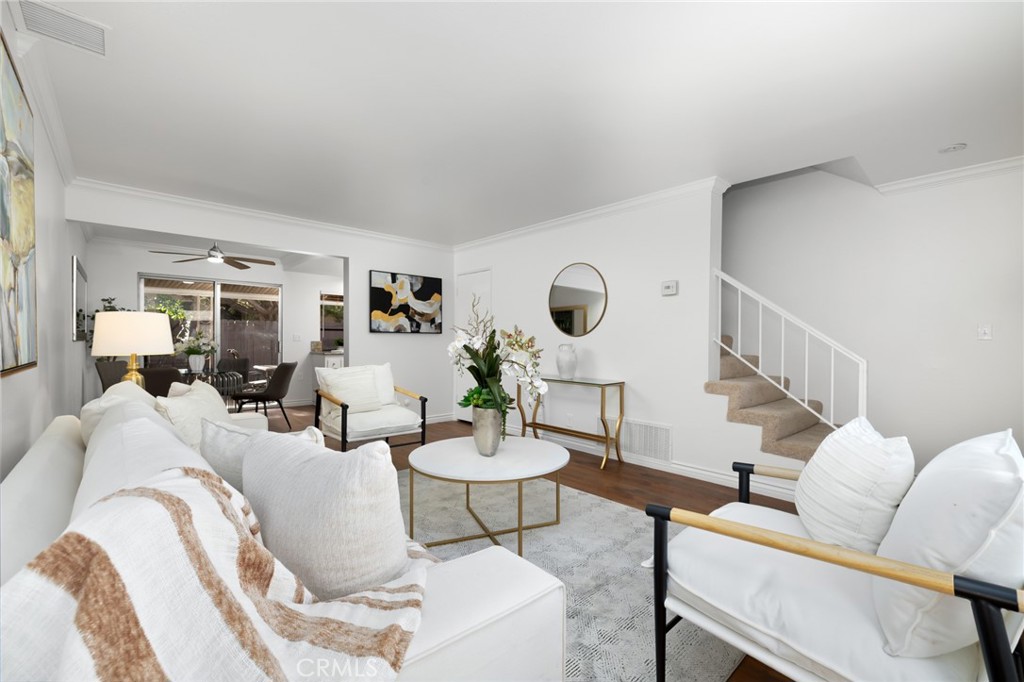 914 Fairview Avenue, Unit 13 Arcadia, CA 91007 - Photo 7 of 39 a living room with furniture and a dining room