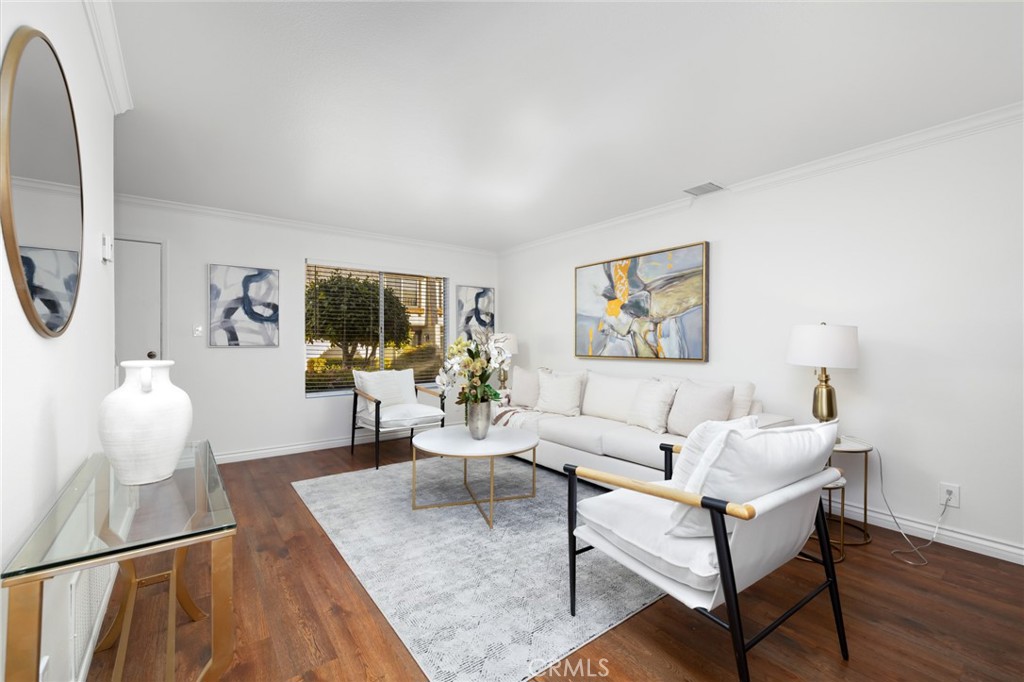 914 Fairview Avenue, Unit 13 Arcadia, CA 91007 - Photo 9 of 39 a living room with furniture and a flat screen tv