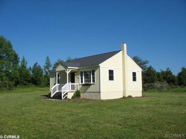 17072 Ancient Acres Road Beaverdam, VA 23015 - Photo 1 of 7 a front view of house with yard and green space