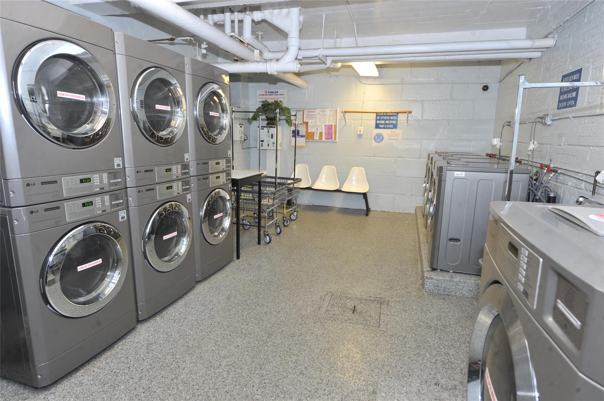 202-35 Foothill Avenue, Unit A78 Queens, NY 11423 - Photo 12 of 12 a utility room with dryer and washer