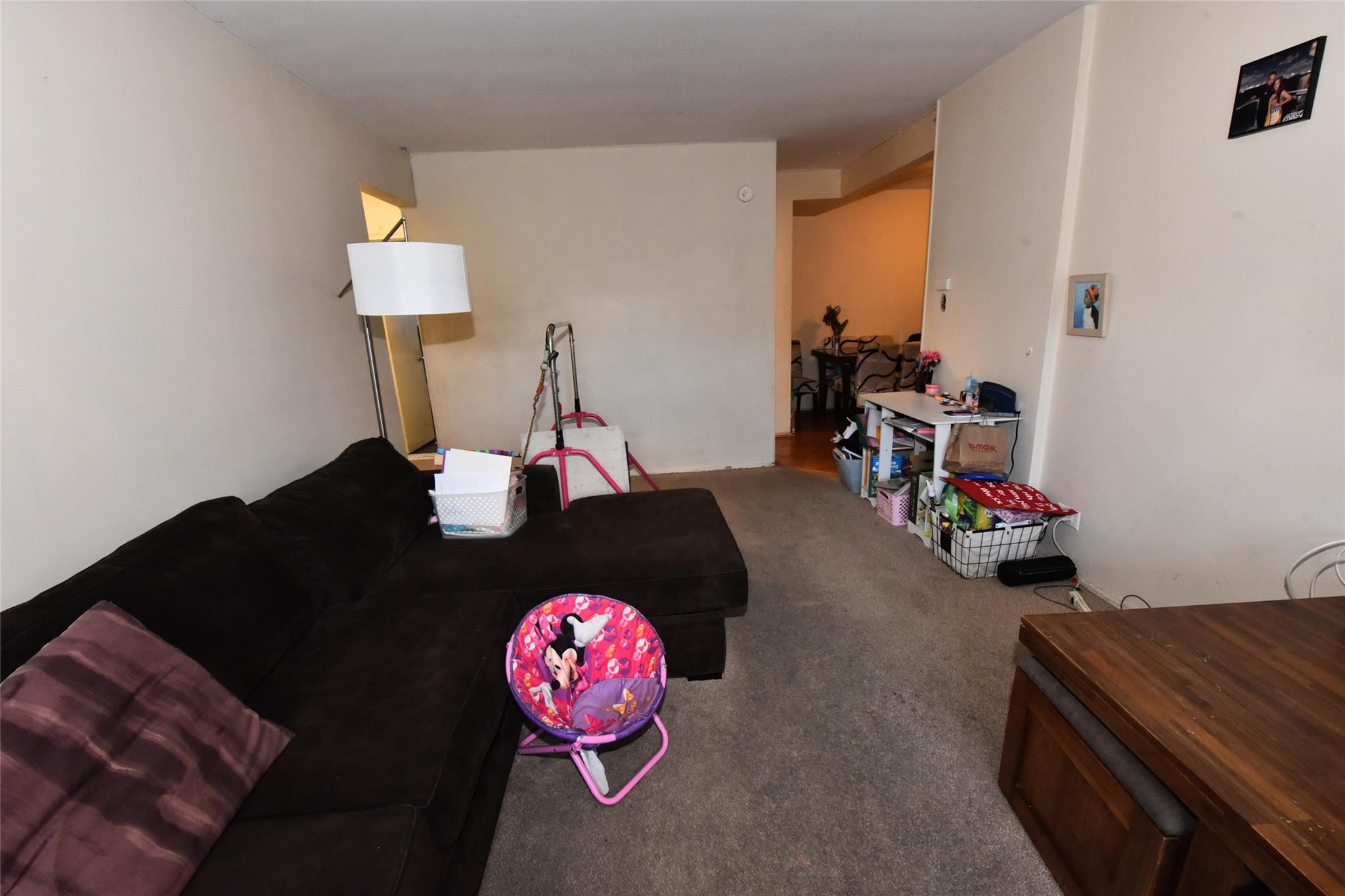 202-35 Foothill Avenue, Unit A78 Queens, NY 11423 - Photo 5 of 12 a living room with furniture