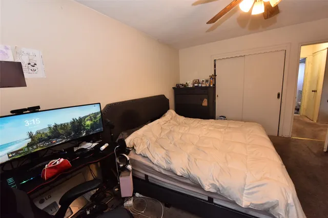 a bed room with a bed and a table