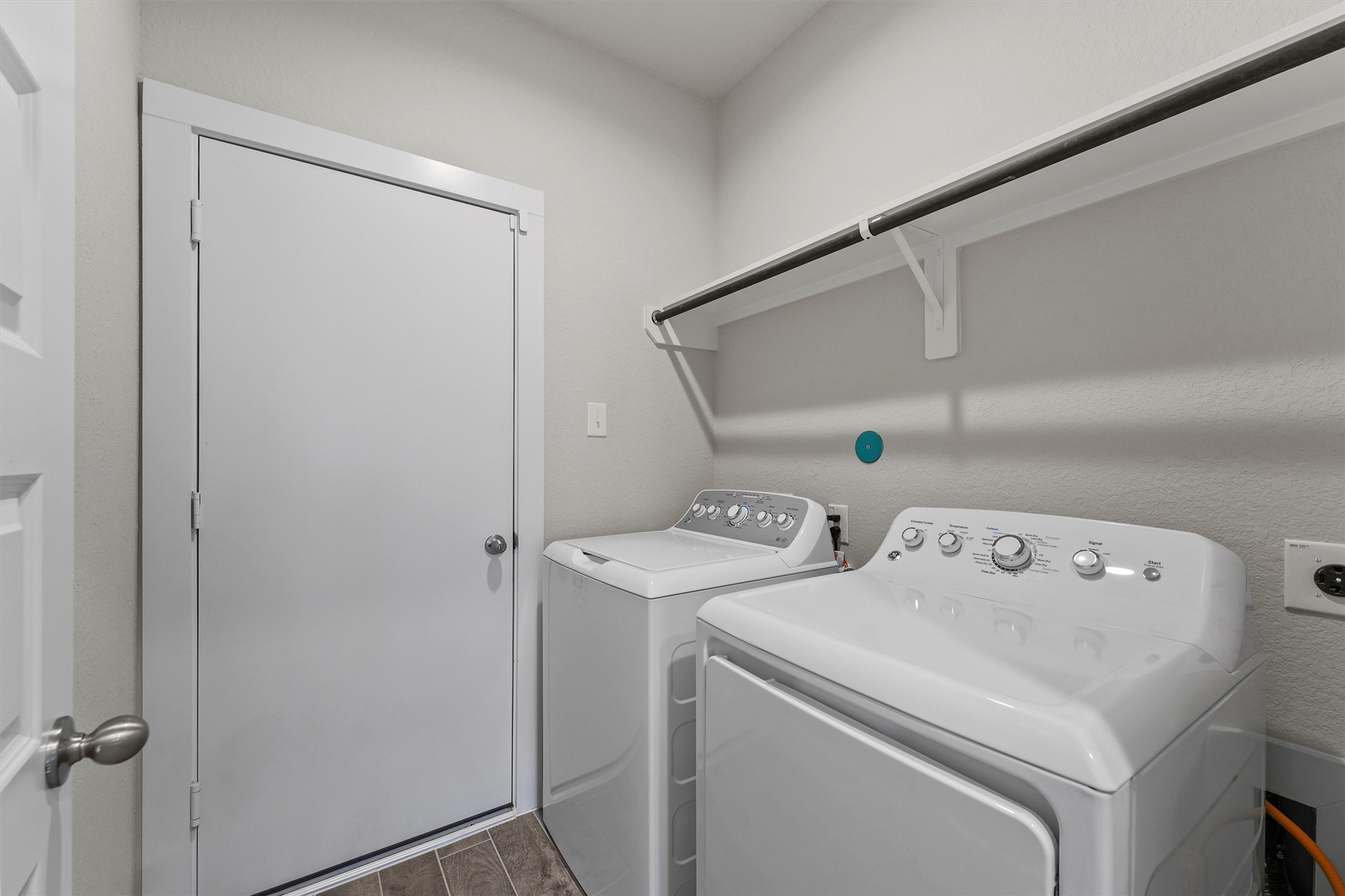29357 Sycamore Cave Lane Spring, TX 77386 - Photo 14 of 21 a utility room with dryer and washer