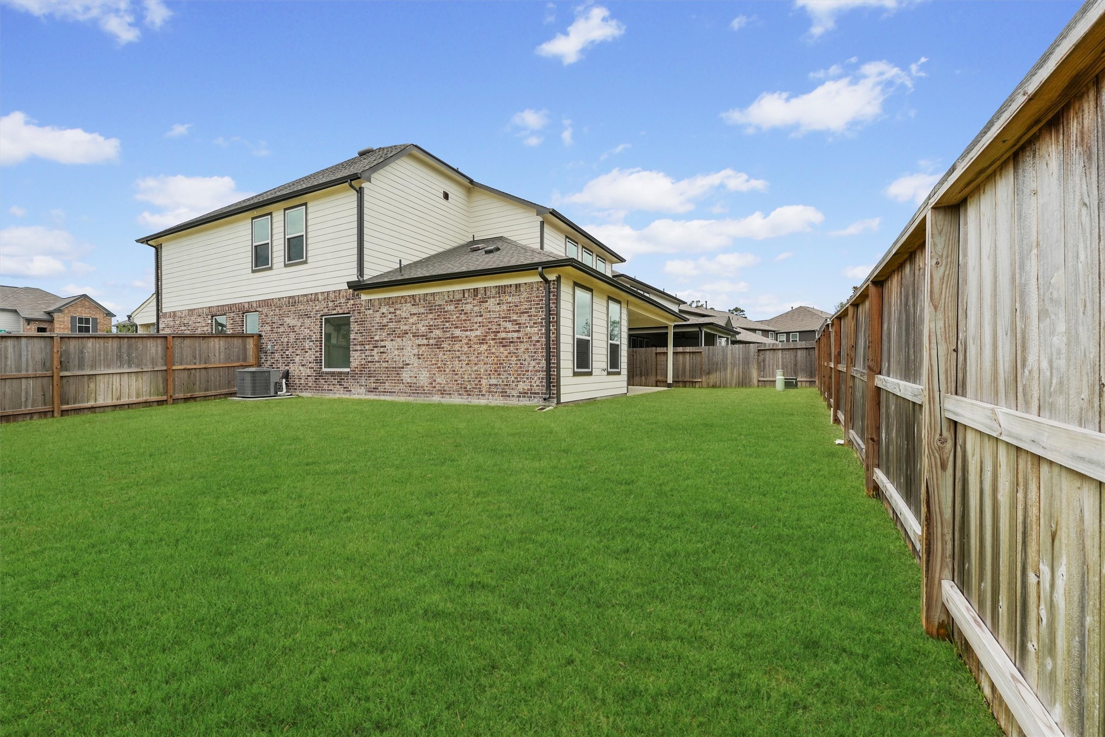 29357 Sycamore Cave Lane Spring, TX 77386 - Photo 16 of 21 a view of a house with a yard