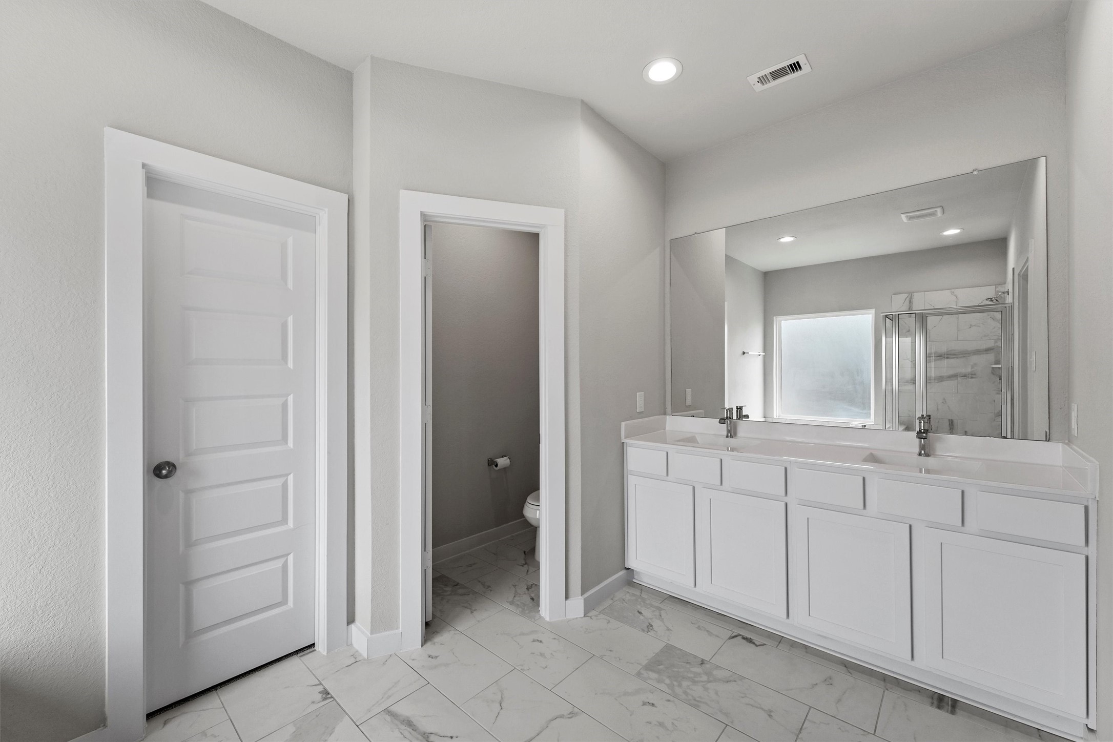 29357 Sycamore Cave Lane Spring, TX 77386 - Photo 6 of 21 a spacious bathroom with a mirror and a sink