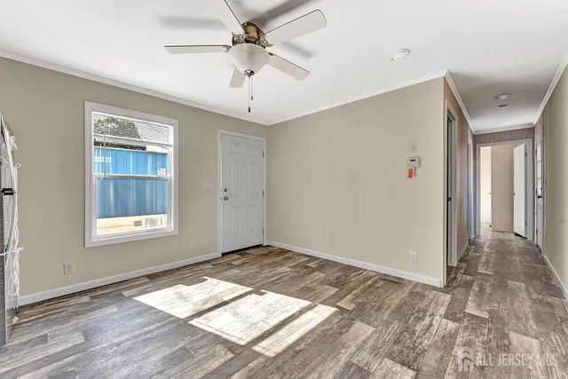 a view of an empty room and window