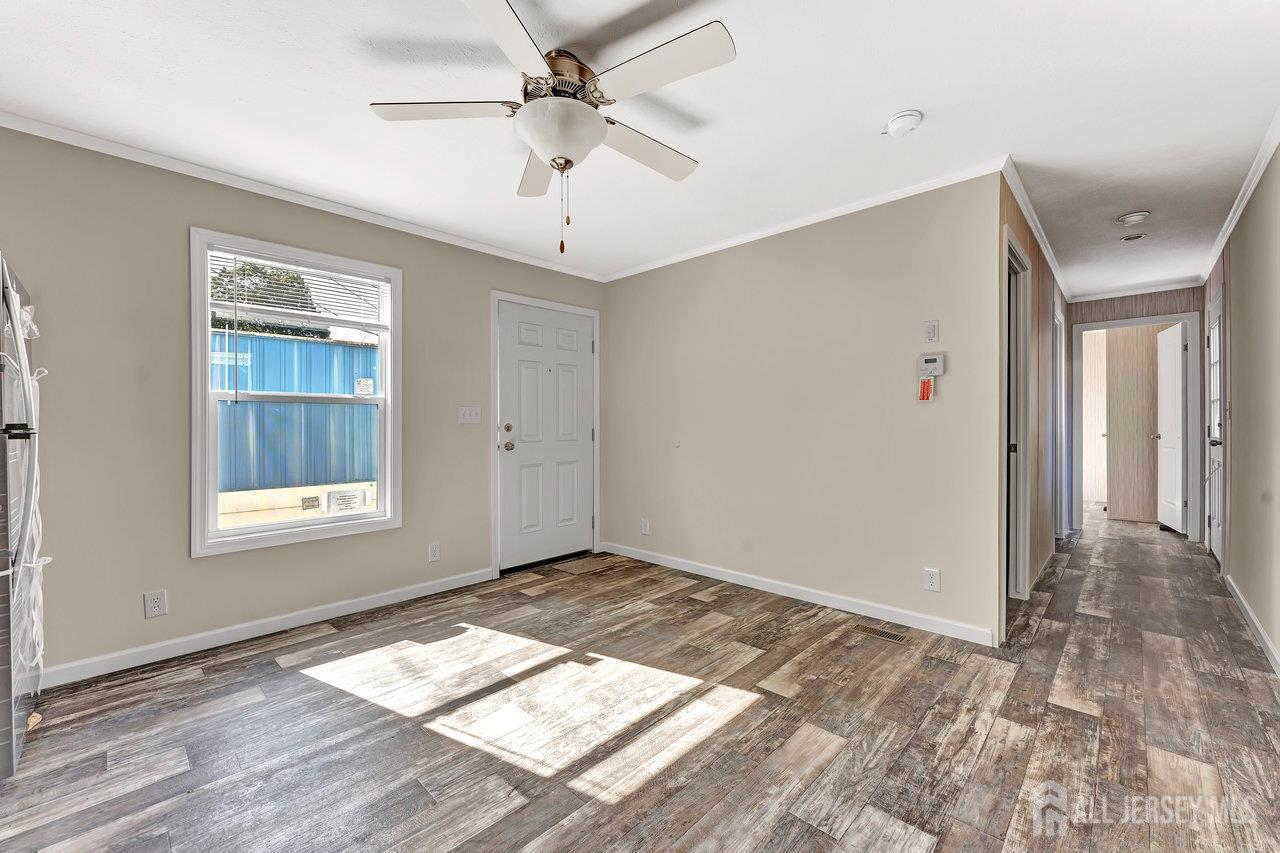 2505 Woodbridge Avenue, Unit 19L Edison, NJ 08817 - Photo 5 of 8 a view of an empty room and window