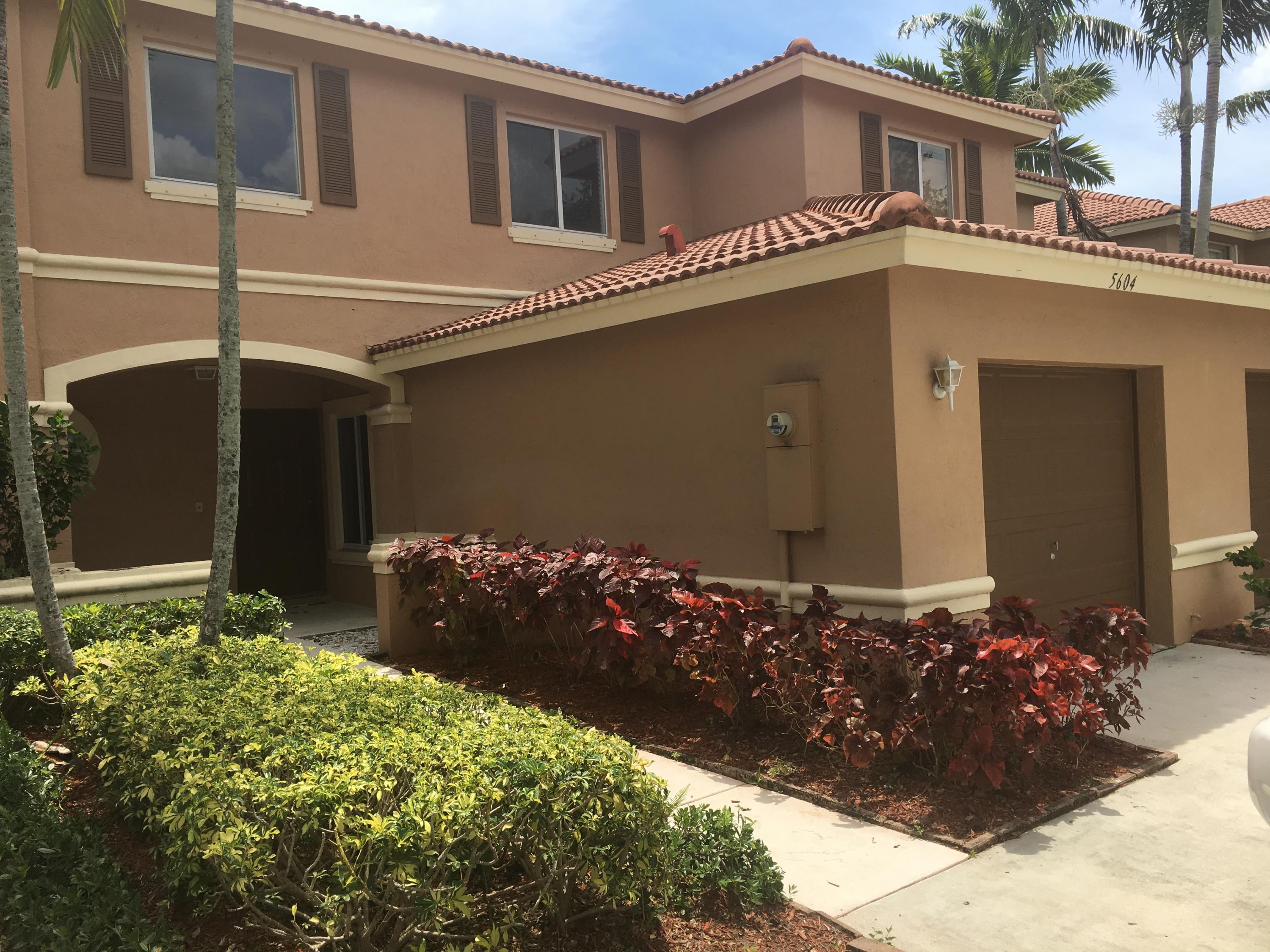 5604 Crossing Rocks Court Riviera Beach, FL 33407 - Photo 1 of 41 Front