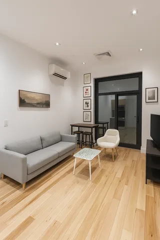 a living room with furniture and a table