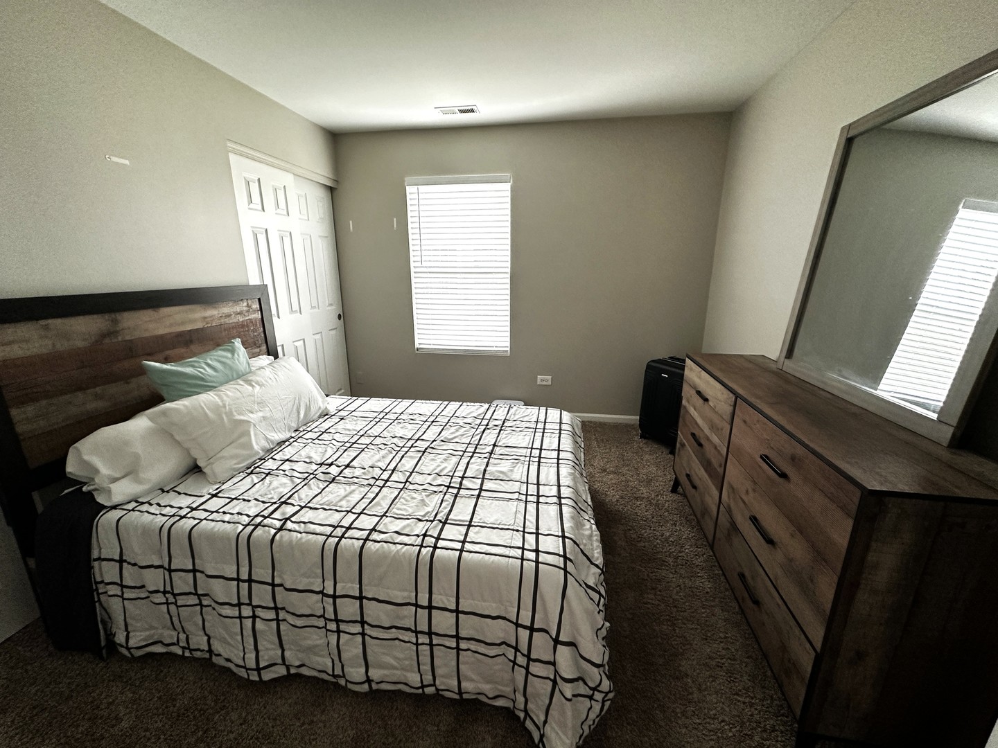 1688 Trails End Lane Bolingbrook, IL 60490 - Photo 12 of 18 a bedroom with a bed next to a window