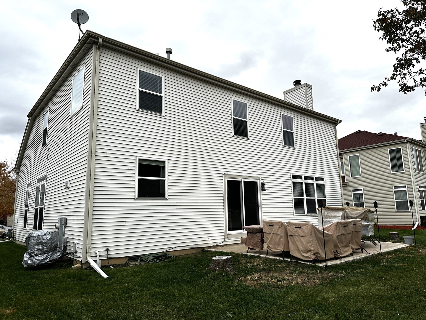 1688 Trails End Lane Bolingbrook, IL 60490 - Photo 18 of 18 a view of a white house next to a yard
