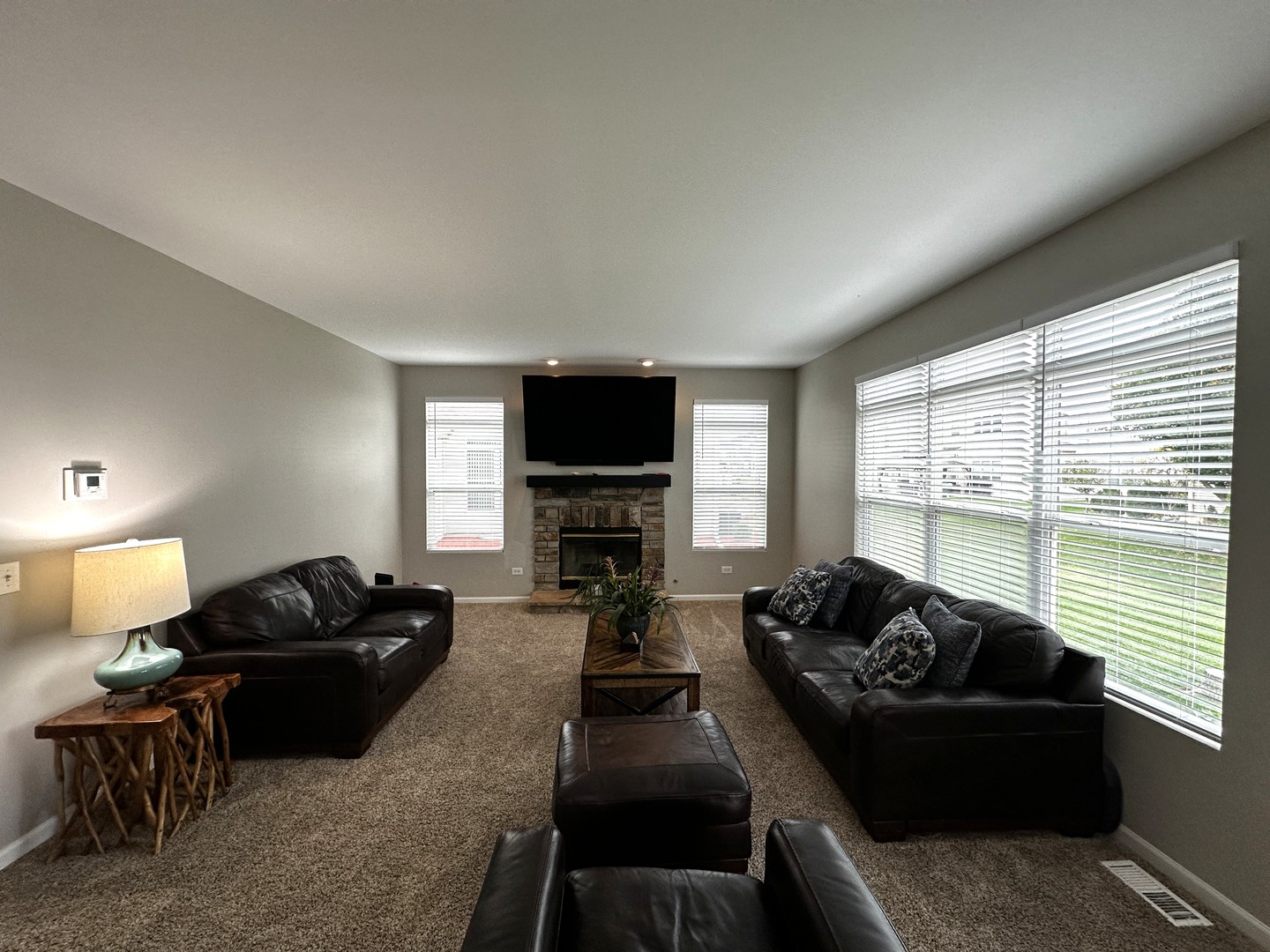 1688 Trails End Lane Bolingbrook, IL 60490 - Photo 4 of 18 a living room with furniture fireplace and flat screen tv