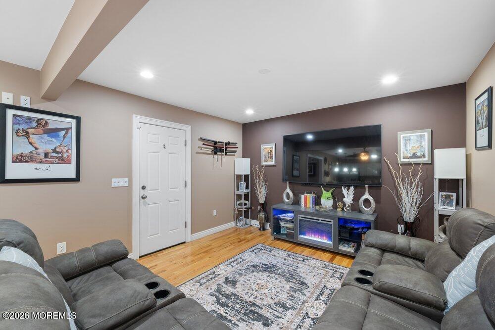 39 Cypress Road Toms River, NJ 08753 - Photo 12 of 52 a living room with furniture and rug