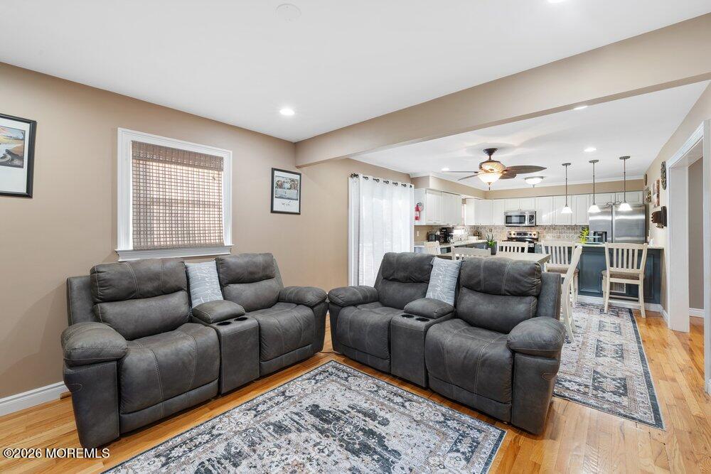 39 Cypress Road Toms River, NJ 08753 - Photo 13 of 52 a living room with furniture and view of kitchen