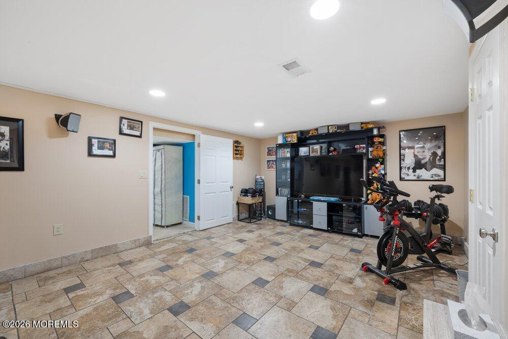 39 Cypress Road Toms River, NJ 08753 - Photo 33 of 52 a view of a room with gym equipment