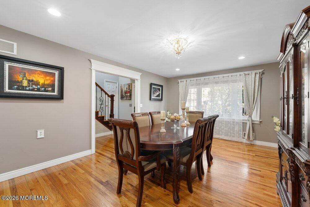 39 Cypress Road Toms River, NJ 08753 - Photo 9 of 52 a view of a dining room with furniture window and wooden floor