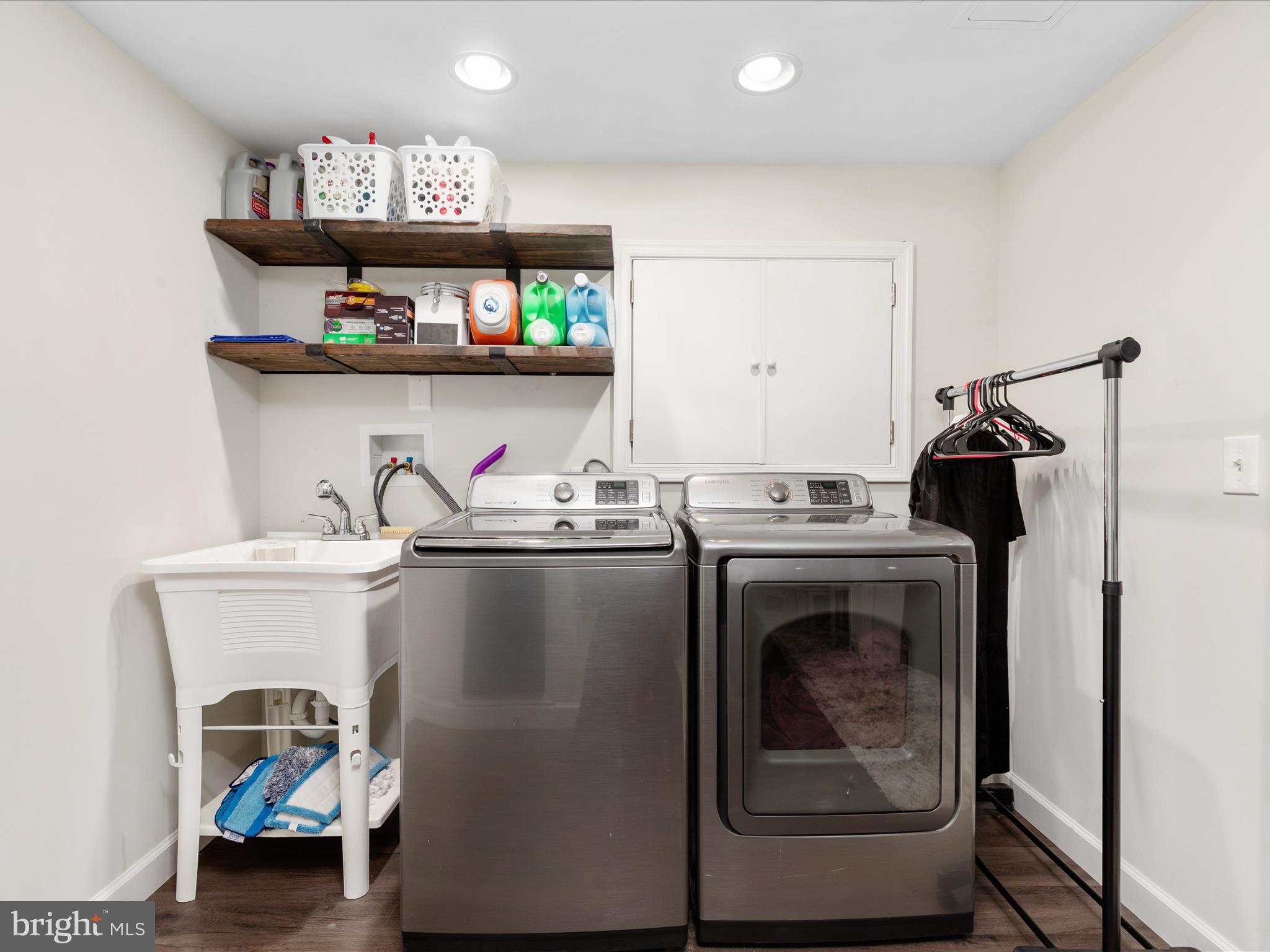 8490 Magic Tree Court Springfield, VA 22153 - Photo 32 of 47 Laundry with upper level shoot access