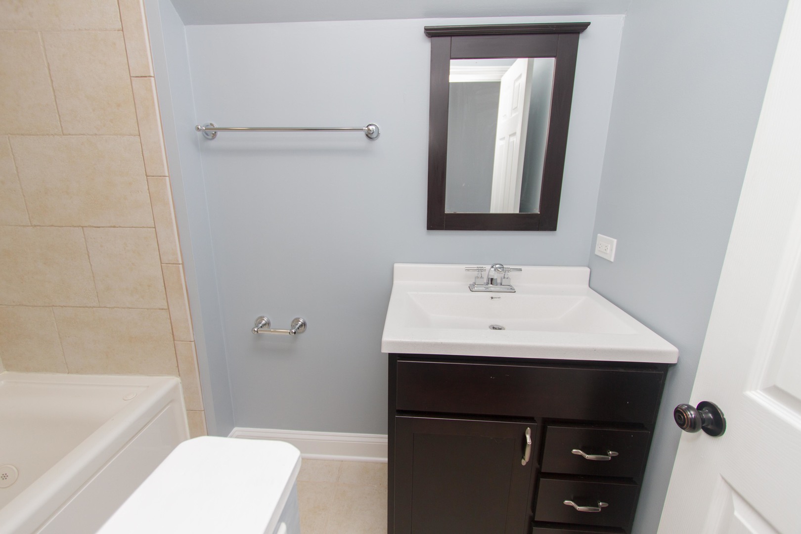 6519 28th Street Berwyn, IL 60402 - Photo 20 of 28 a bathroom with a sink a toilet and shower