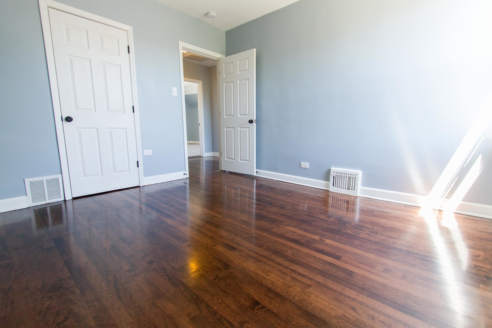 6519 28th Street Berwyn, IL 60402 - Photo 22 of 28 a view of an empty room with wooden floor