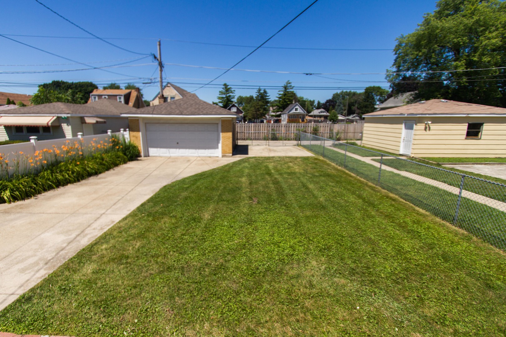 6519 28th Street Berwyn, IL 60402 - Photo 28 of 28 a front view of a house with a yard