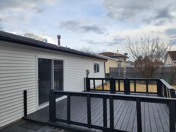 a view of a house with a roof deck