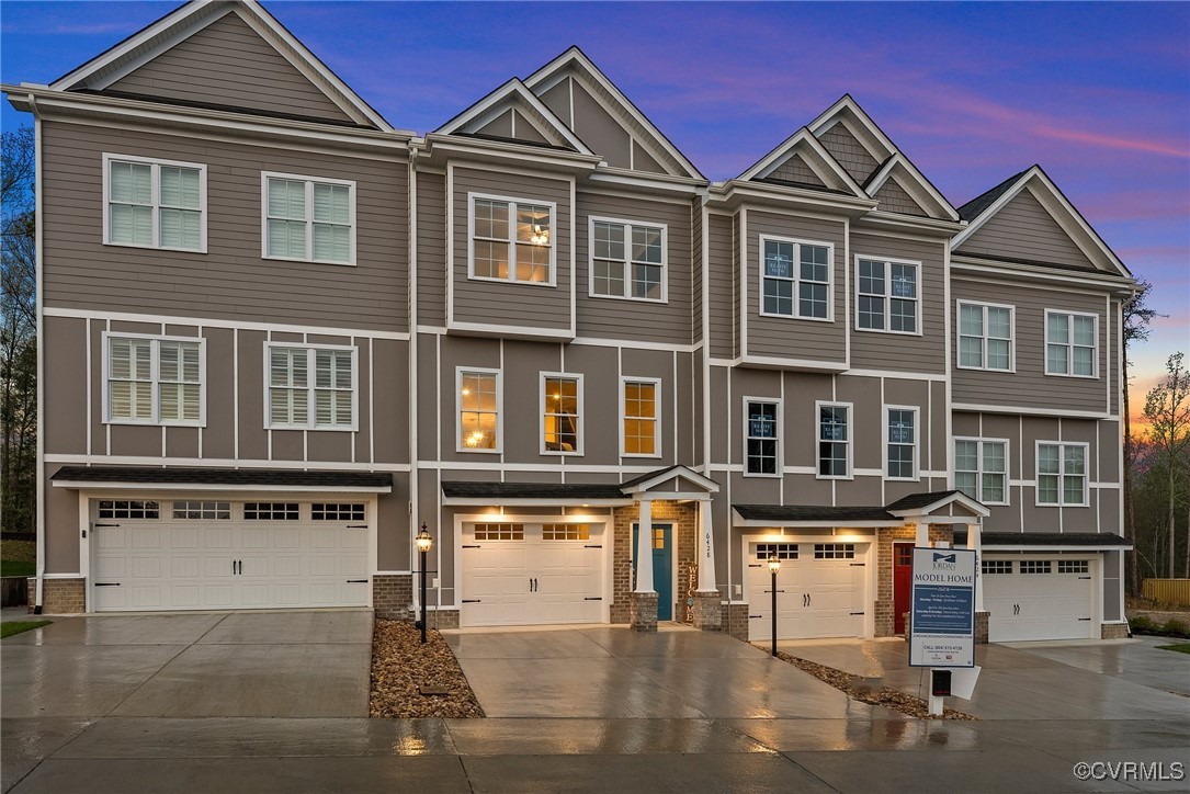 6408 Sanford Spgs Cove Midlothian, VA 23112 - Photo 1 of 39 a view of a big house with large windows