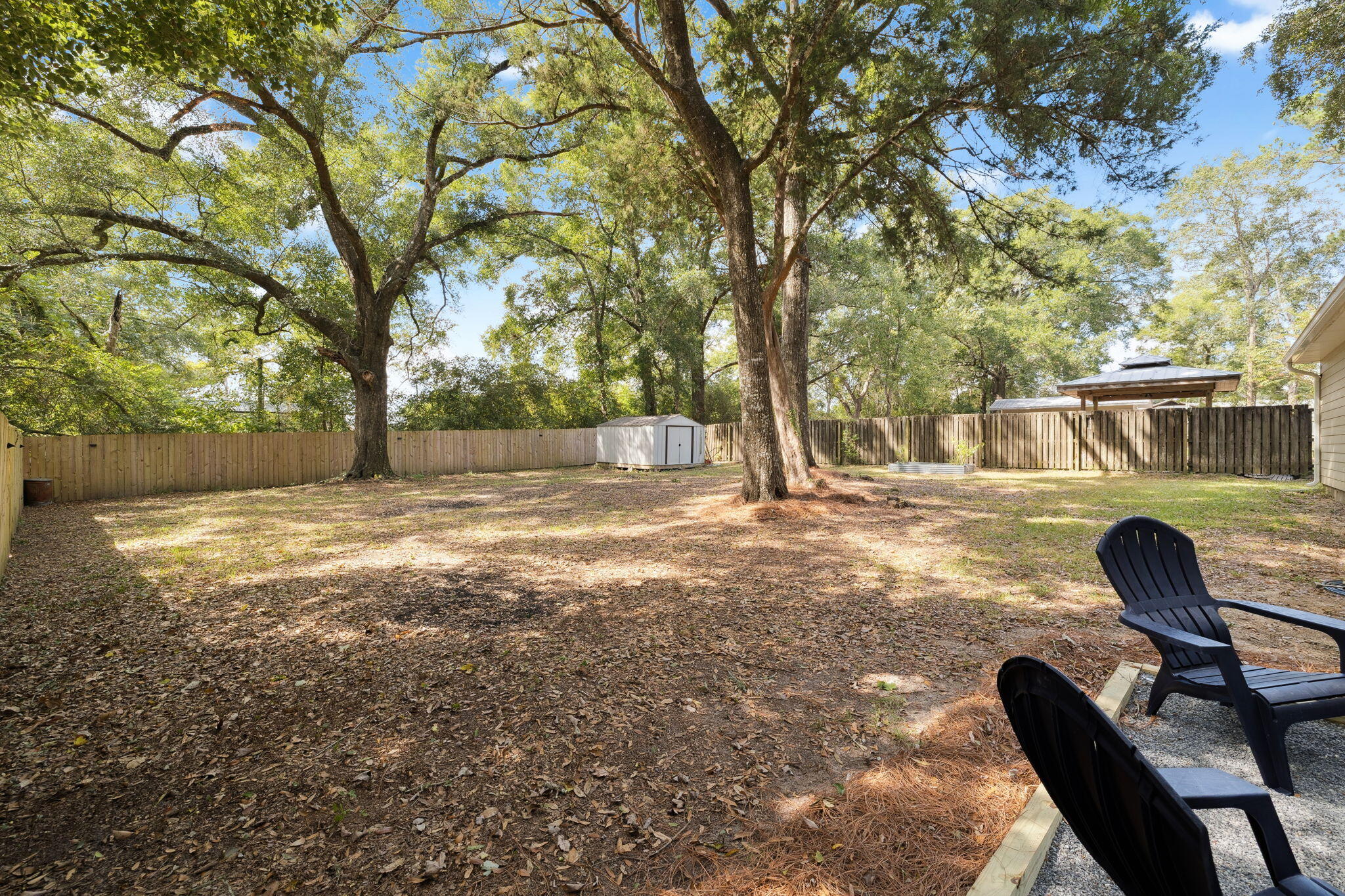 82 Live Oak Street Freeport, FL 32439 - Photo 18 of 22 a view of backyard of a house