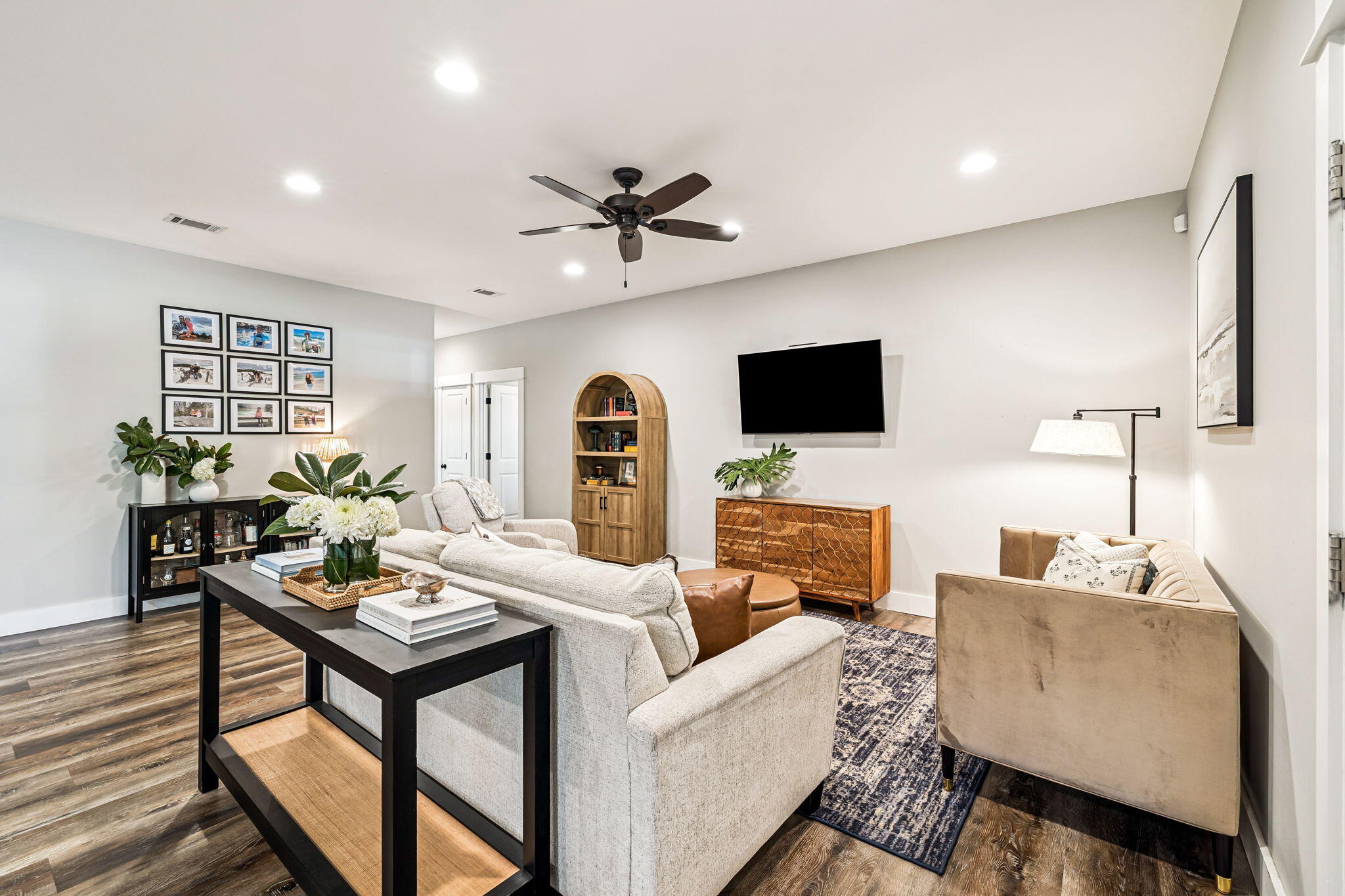 82 Live Oak Street Freeport, FL 32439 - Photo 2 of 22 a living room with furniture a rug and a flat screen tv