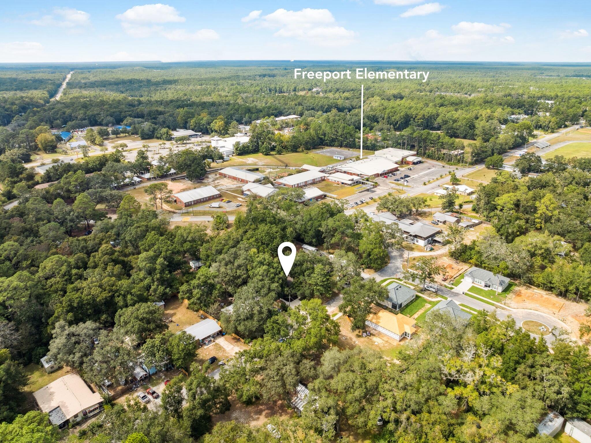 82 Live Oak Street Freeport, FL 32439 - Photo 21 of 22 a view of a city