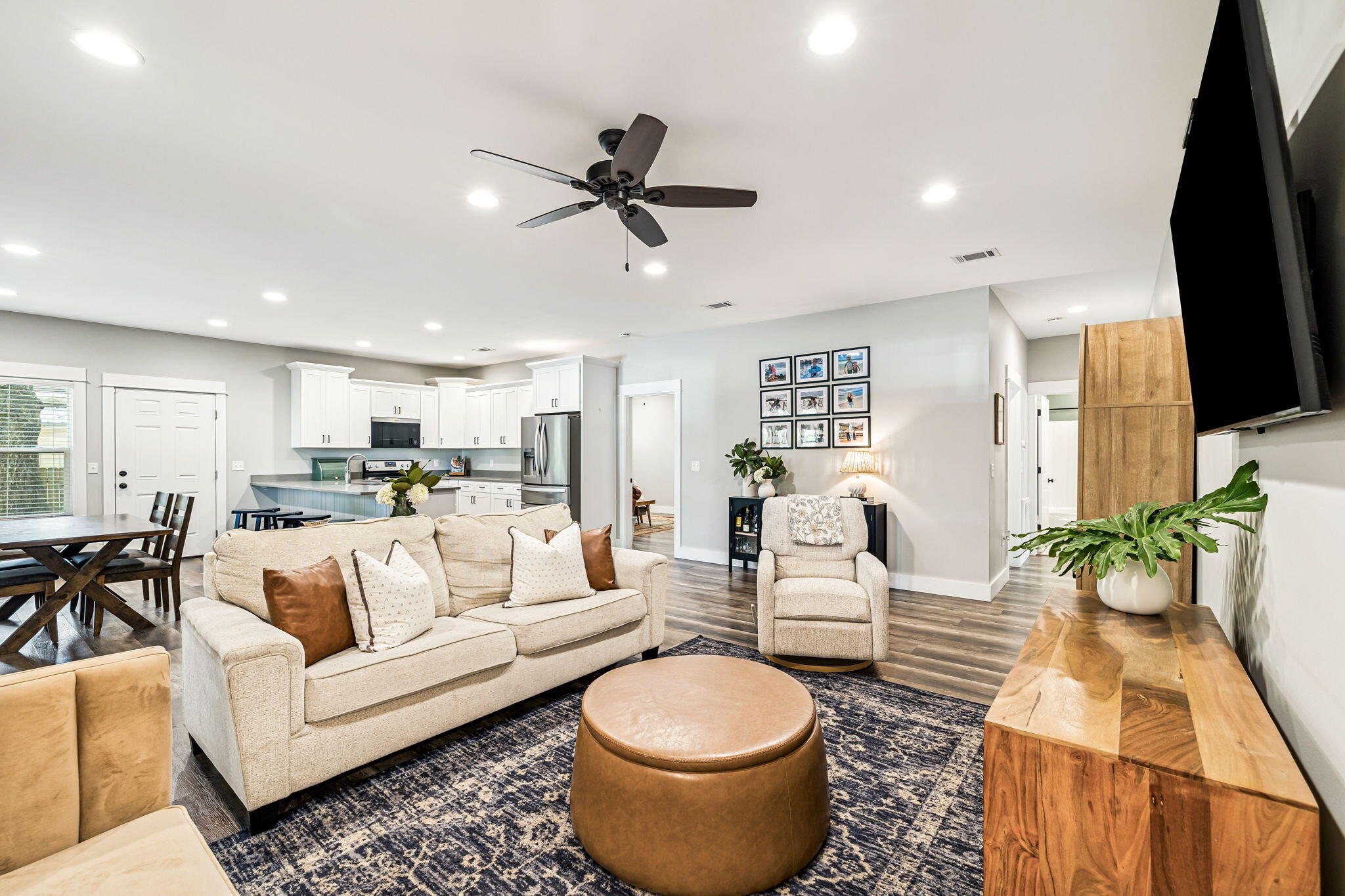 82 Live Oak Street Freeport, FL 32439 - Photo 3 of 22 a living room with furniture a rug and a flat screen tv