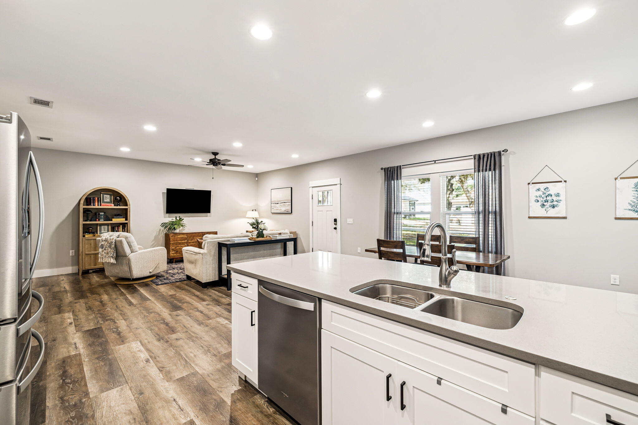 82 Live Oak Street Freeport, FL 32439 - Photo 7 of 22 a kitchen with a sink stainless steel appliances and cabinets