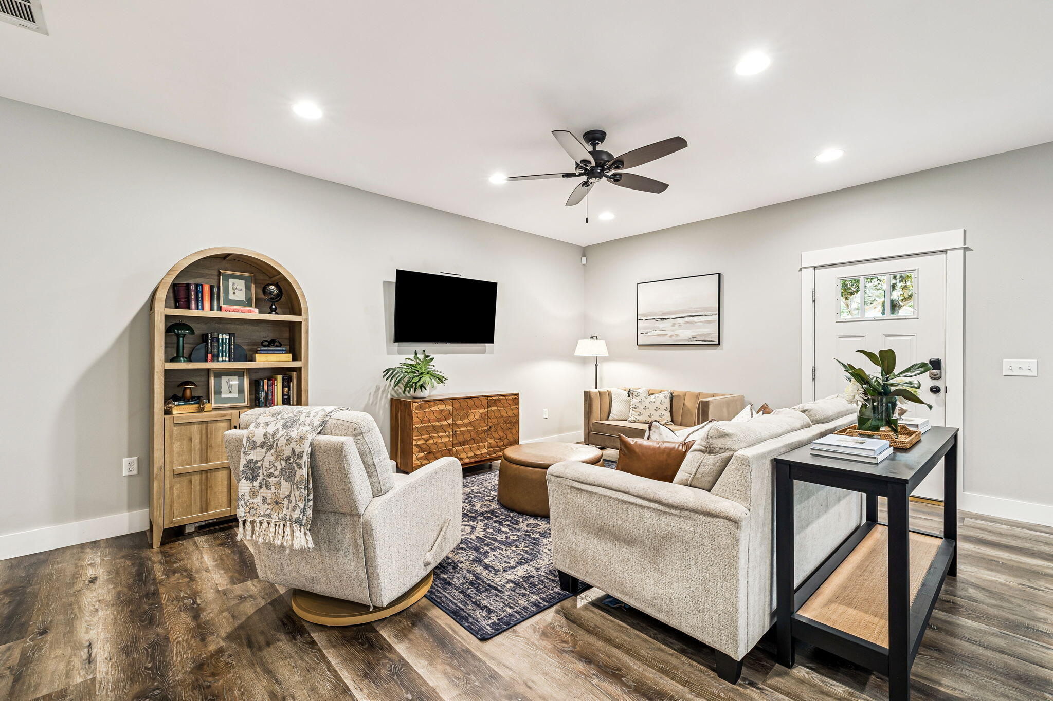 82 Live Oak Street Freeport, FL 32439 - Photo 8 of 22 a living room with furniture a rug and a flat screen tv