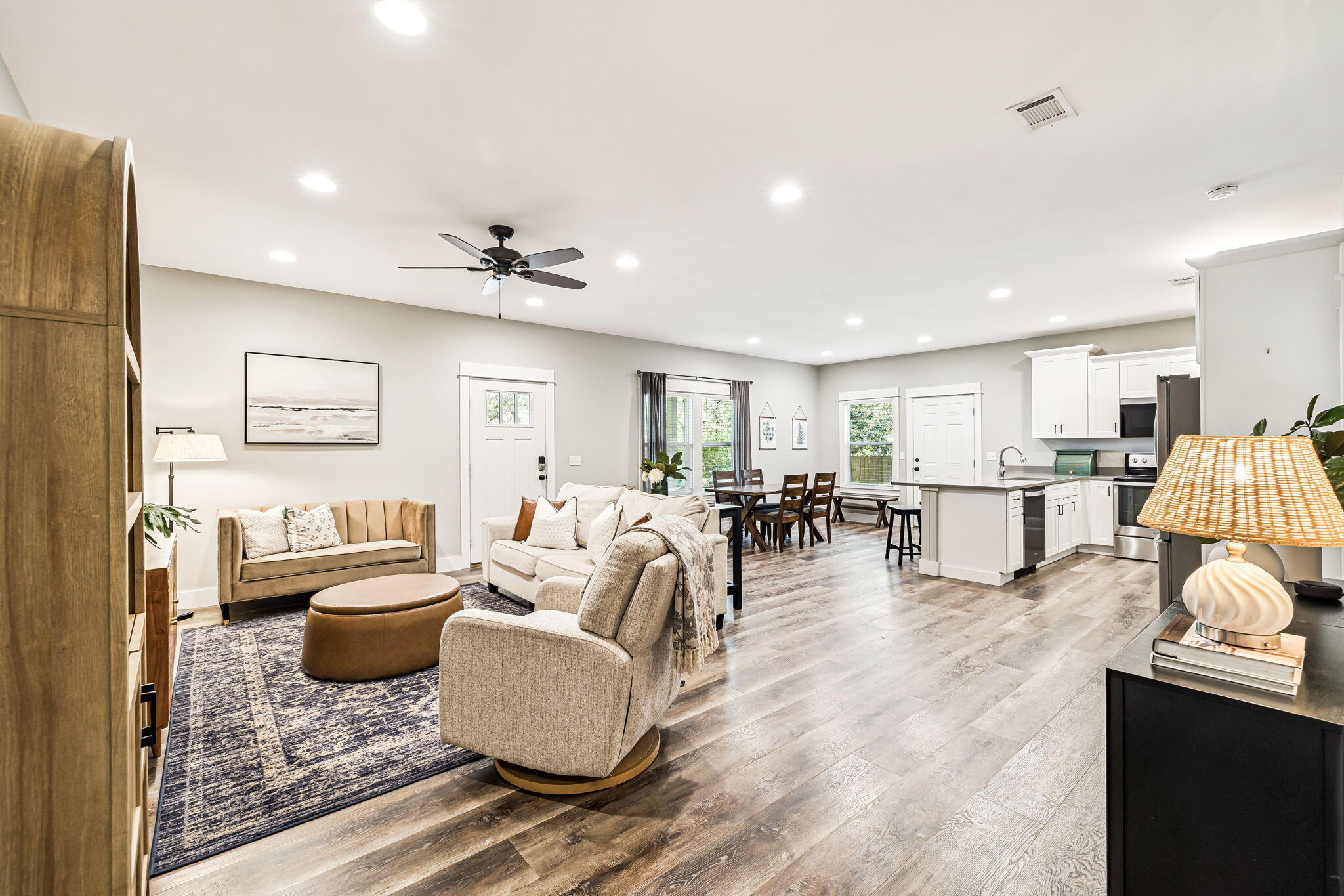 82 Live Oak Street Freeport, FL 32439 - Photo 9 of 22 a living room with furniture and a view of kitchen