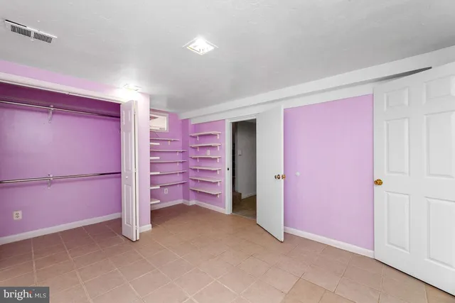 a view of room with closet area