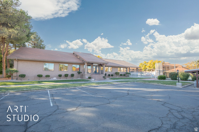 860 South Village Road, Unit A6 St. George, UT 84770 - Photo 16 of 41 View of building exterior with uncovered parking